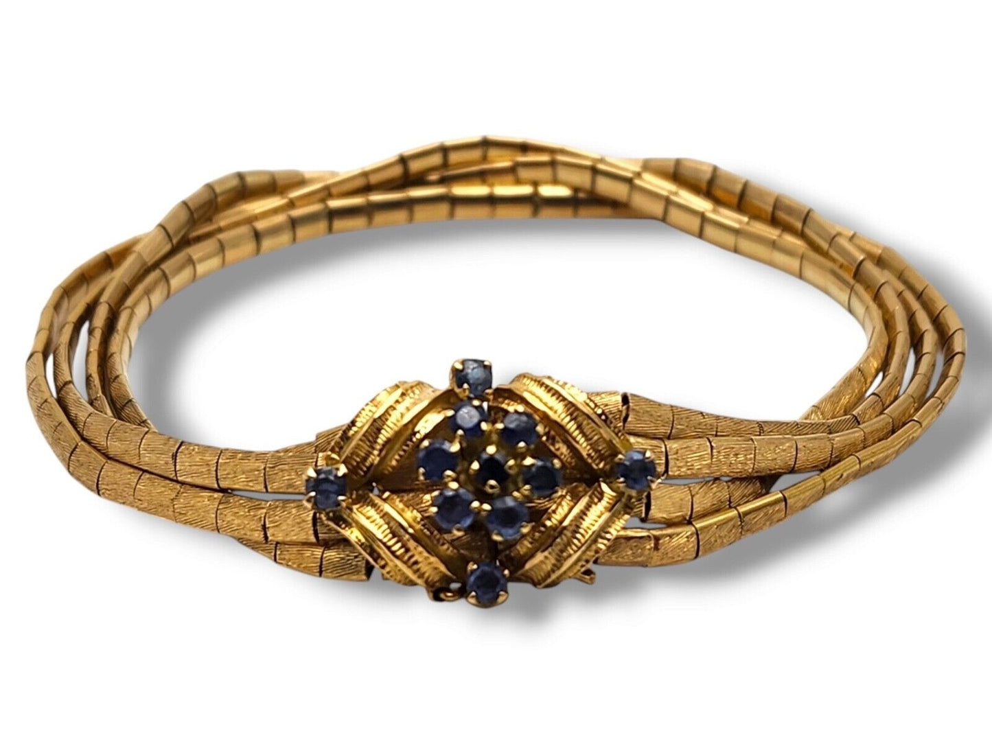 Rare Lovely Vintage 18K Gold Bracelet embezzled with Sapphires   29 Grams